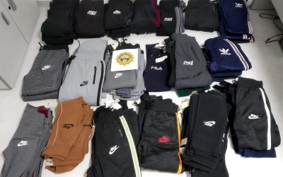 Redován Local Police seize counterfeit footwear and clothing at a market stall